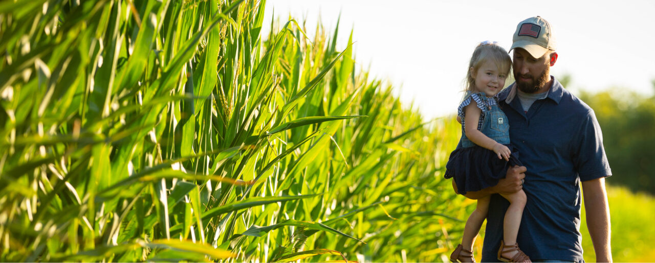 dad and daughter in field