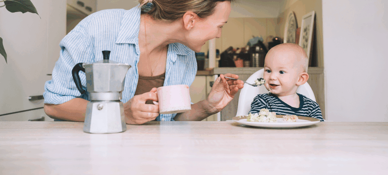 mom feeding baby