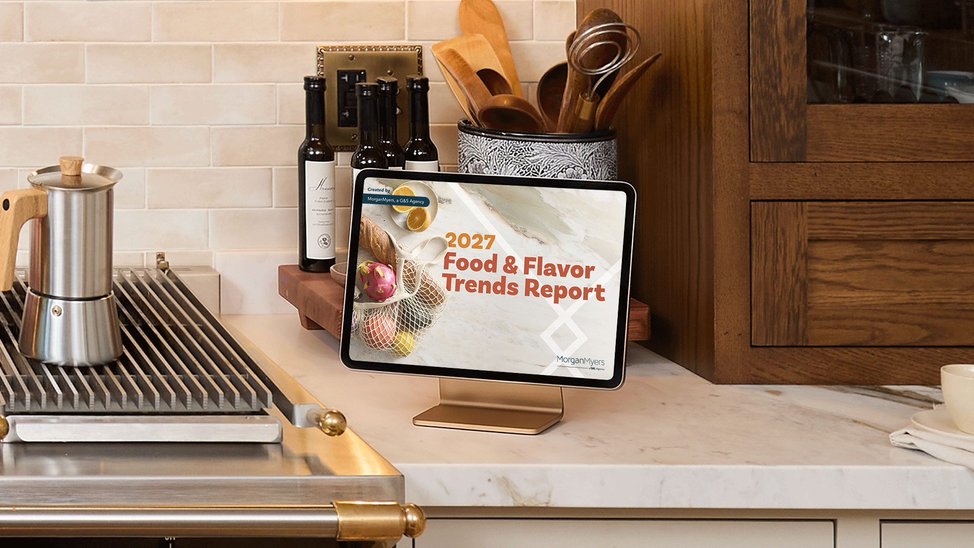 Photo of the MorganMyers 2027 Food & Flavor Trends Report on an iPad in a kitchen